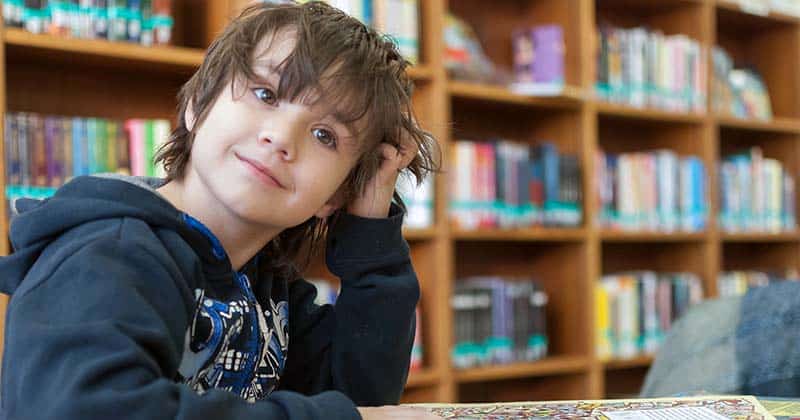 Child in library