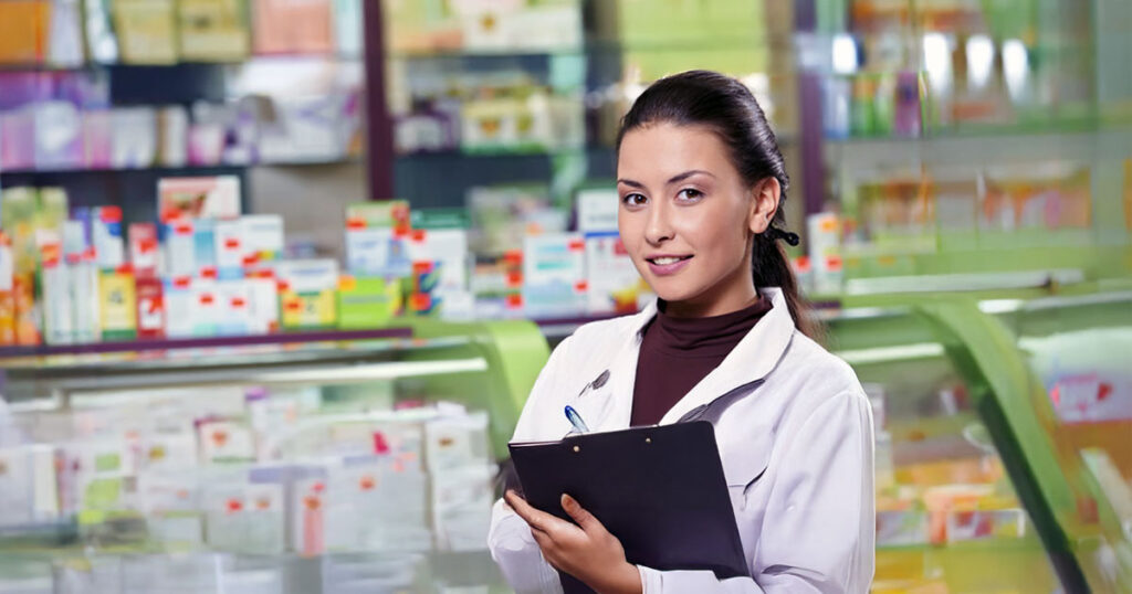 Pharmacist standing filling out form